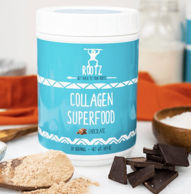 Collagen superfood supplement canister surrounded by chocolates and powder.