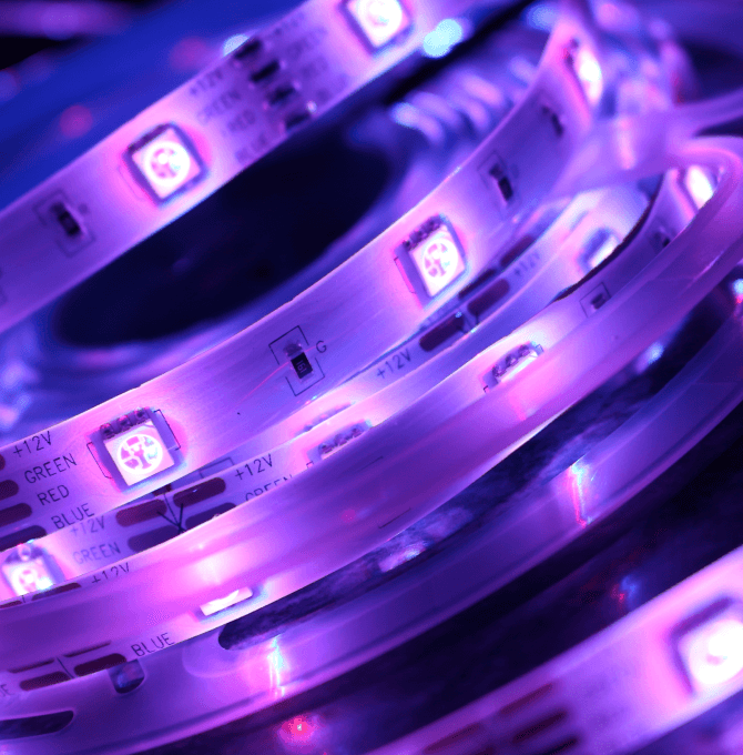 A picture of a purple LED strip with purple lights.